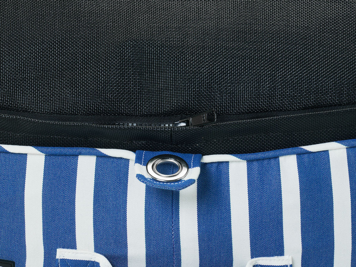 Close-up on a blue and white pool float for adults showing the stitching, durable base, zippers and eyelets.
