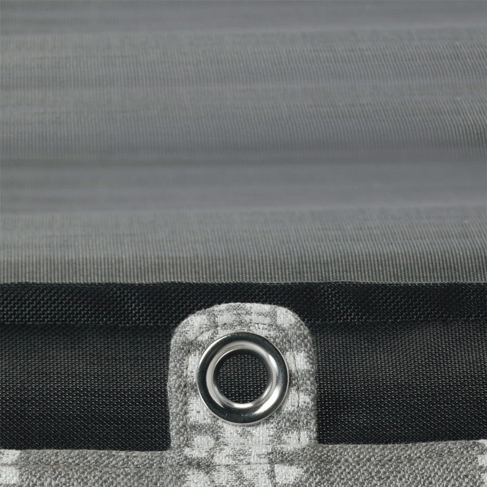 An upside down grey and white striped luxury pool float lounger displaying the zipper, base and stitching.