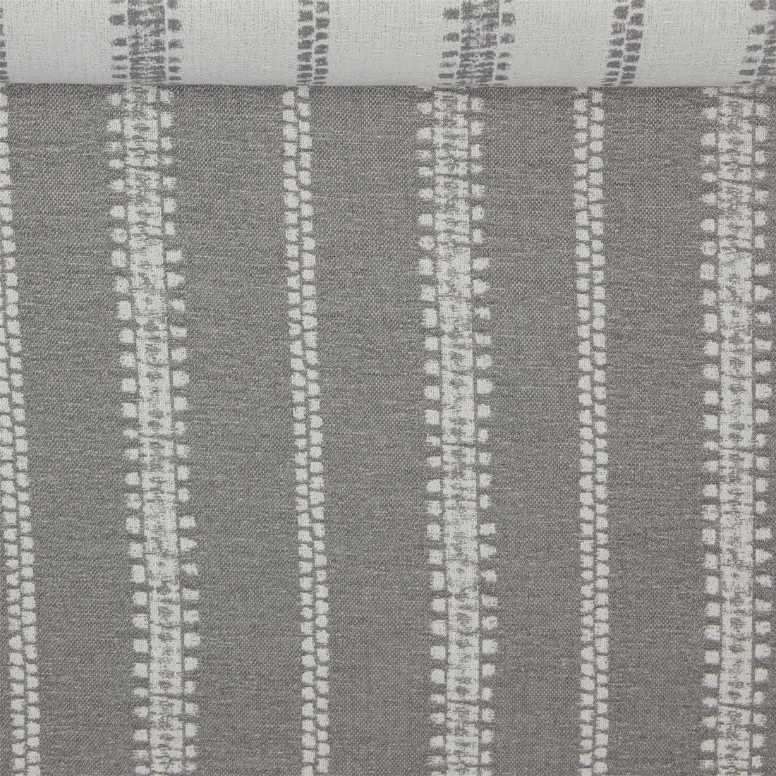 A birds eye view of a jacquard woven grey and white stripe outdoor performance fabric roll.
