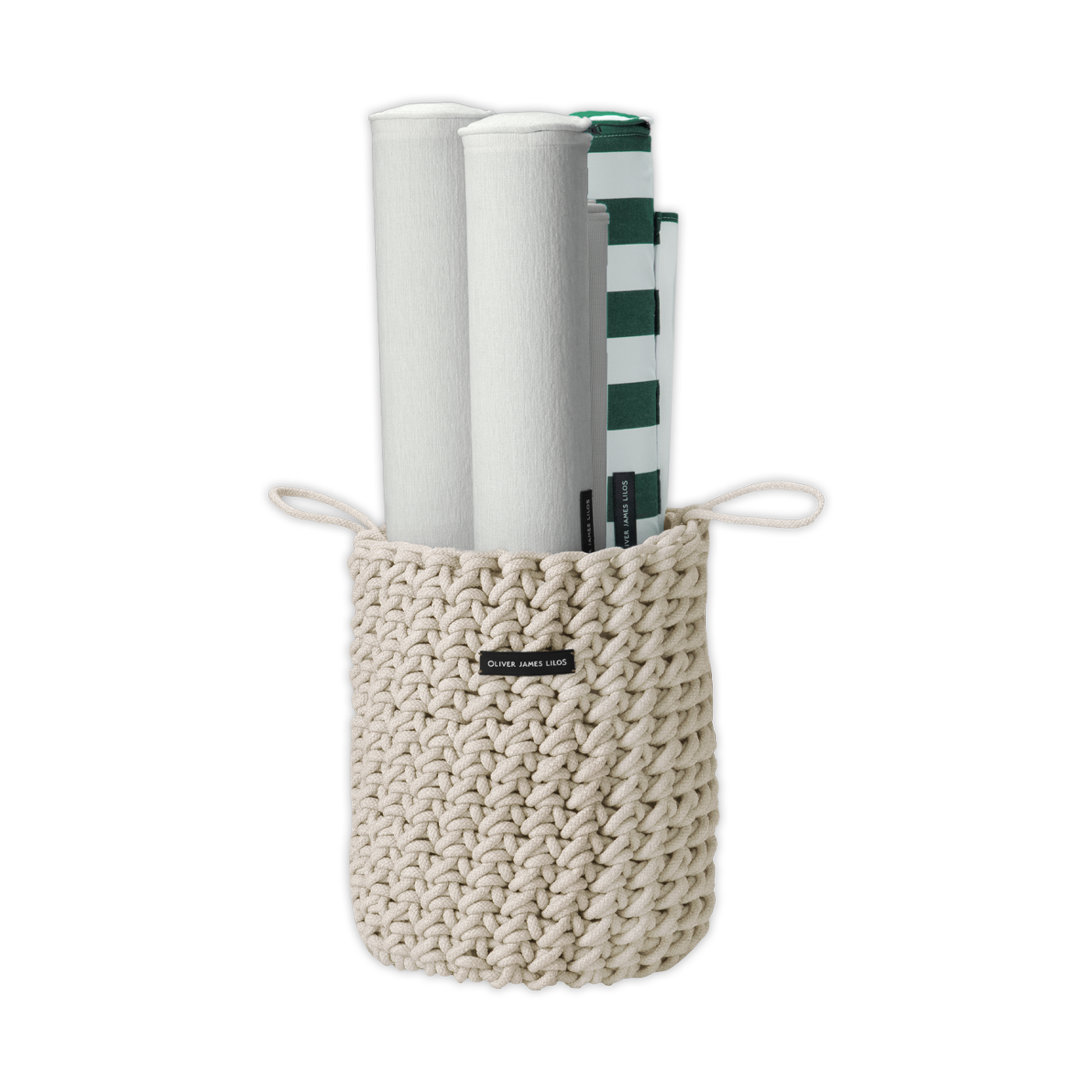 A hand-woven white rope basket containing luxury pool float Hammocks.