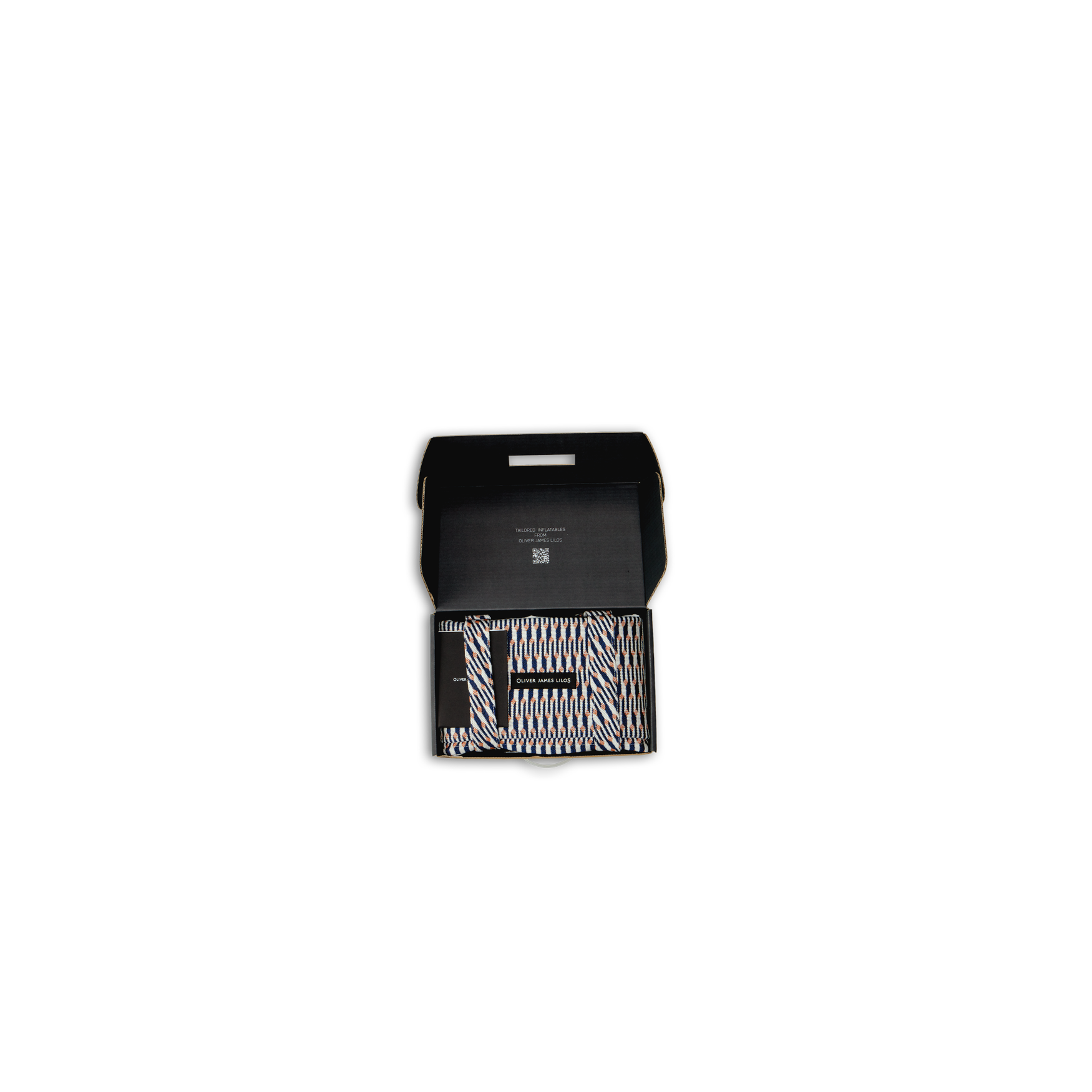 Un hamac de luxe Lilo plié dans une petite boîte noire avec le couvercle ouvert.
