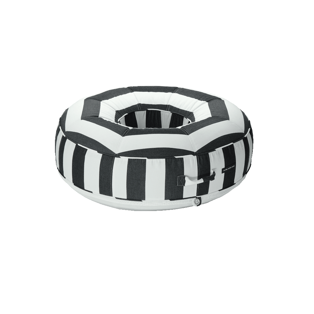 The front angle of a ring black and white striped luxury pool float.