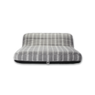 The front profile of a single grey and white striped luxury pool float.