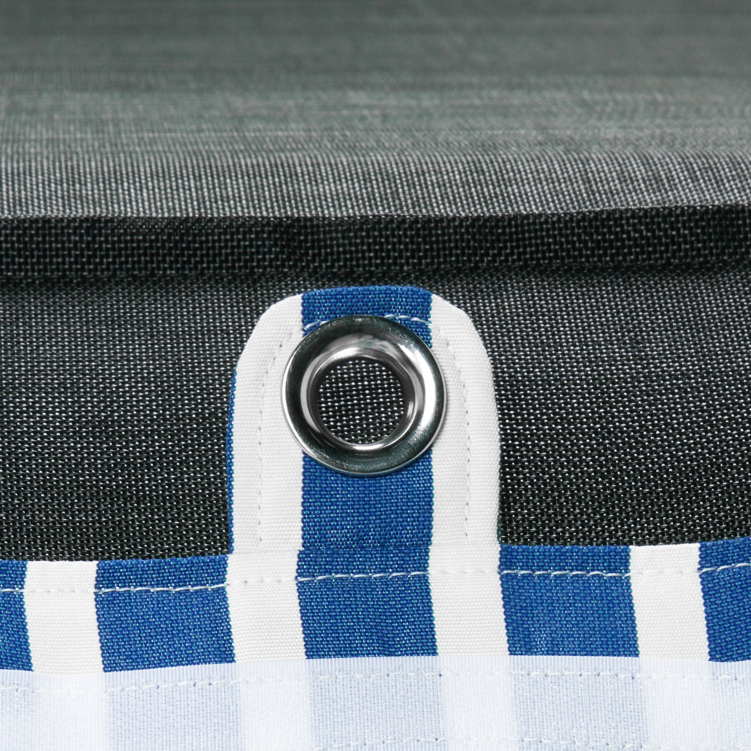 A blue and white stripe fabric pool float for adults upside down displaying the eyelets and base.
