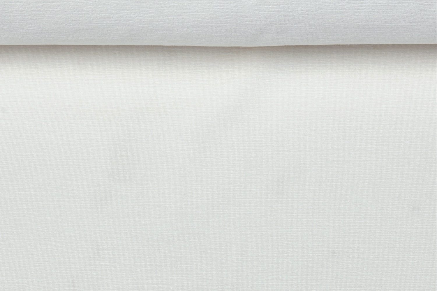 A birds eye view of a white solution dyed acrylic fabric with a terry towel finish.